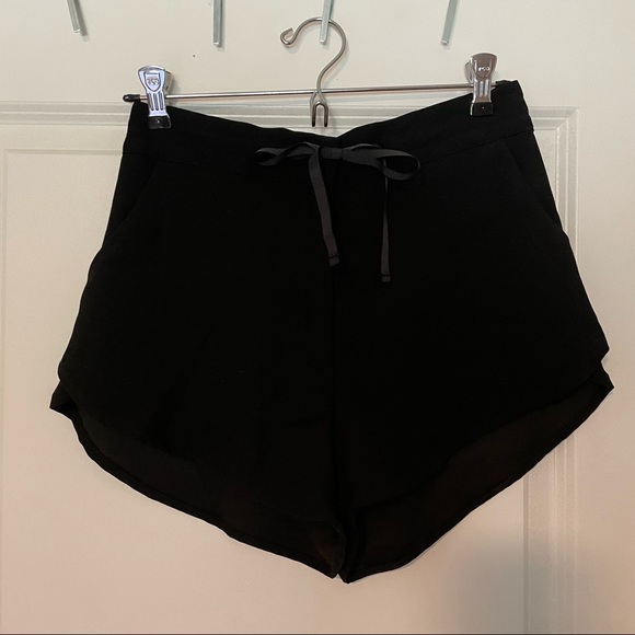 H&M Pants - H&M Black shorts. With zipper and waist tie.